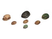 Seven Egyptian Faience and Stone Scarabs