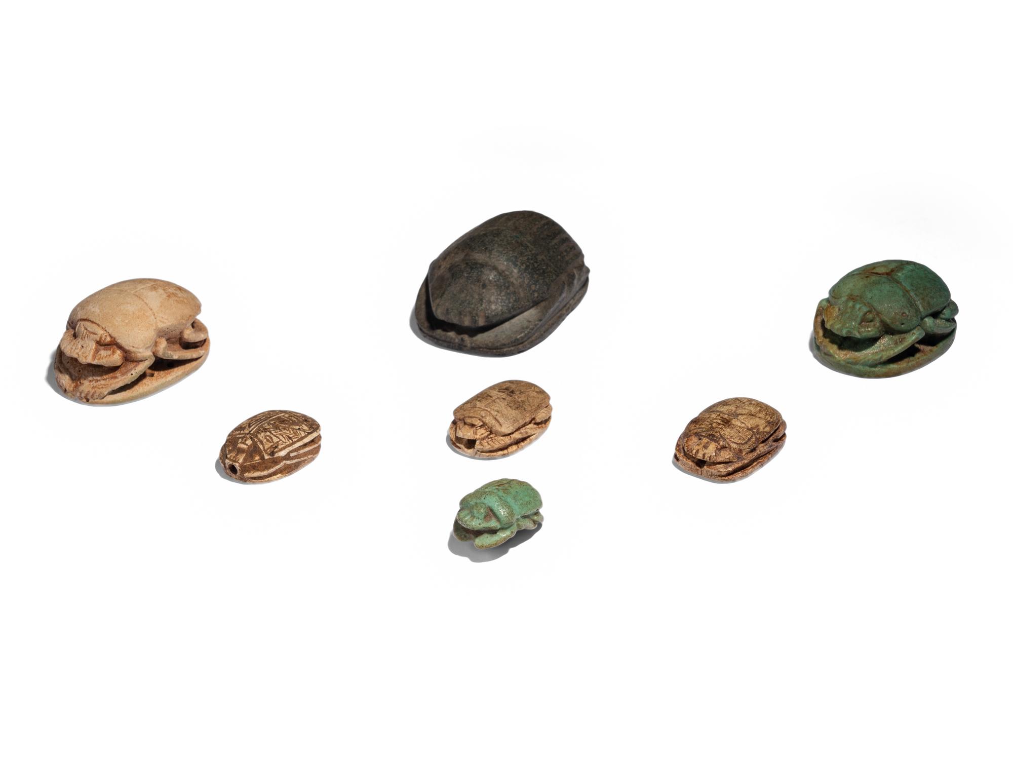 Seven Egyptian Faience and Stone Scarabs
