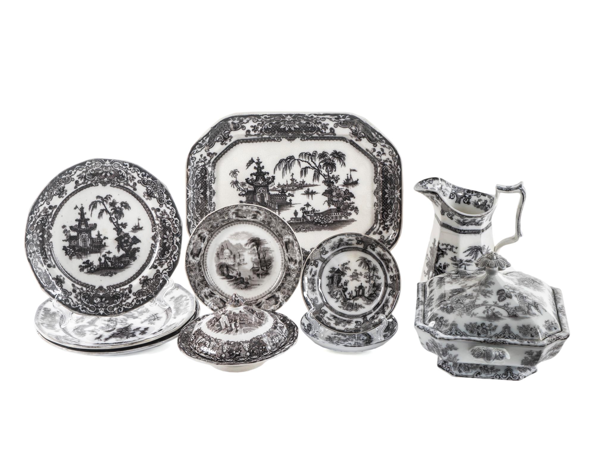 A Group of Black and White Ironstone Dinnerware