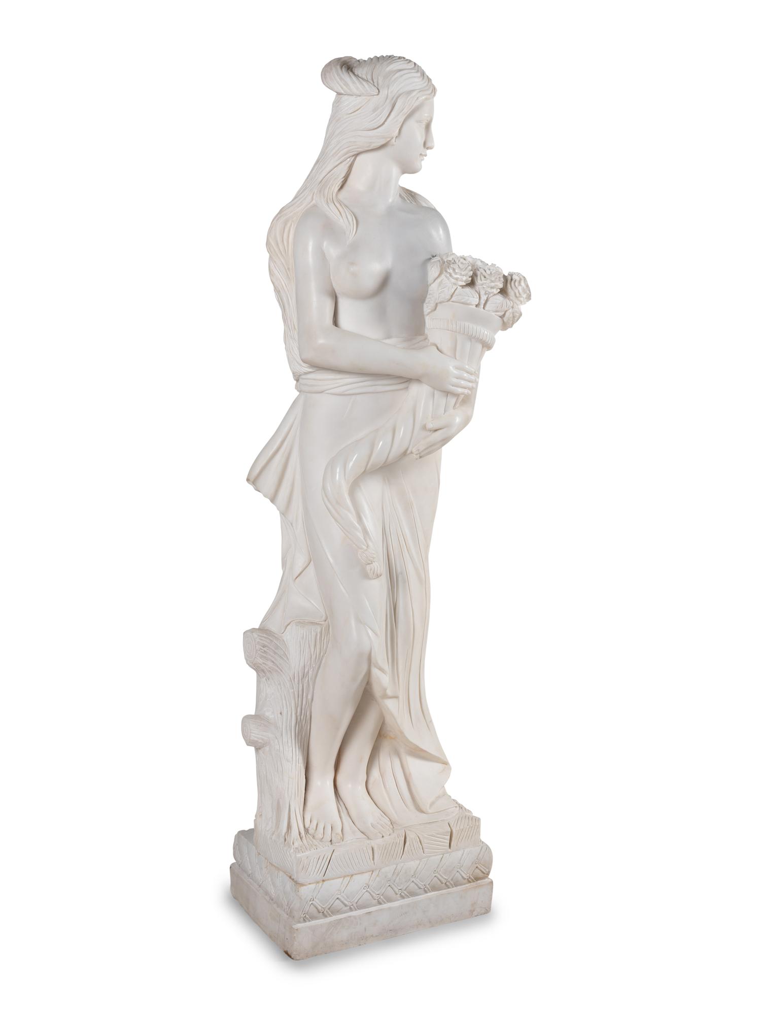A Pair of Carved Marble 'Four Seasons' Figures