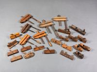 Twenty-Five Wooden Hand Planes and Clamps