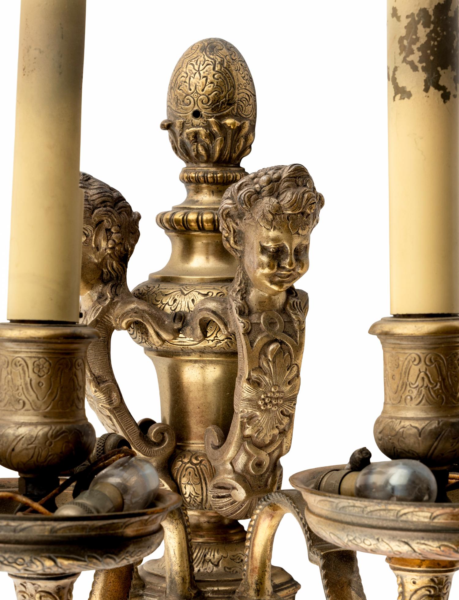 A Pair of Regence Style Silvered Bronze Three-Light Sconces