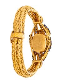 GÜBELIN, YELLOW GOLD, SAPPHIRE AND DIAMOND SURPRISE WATCH