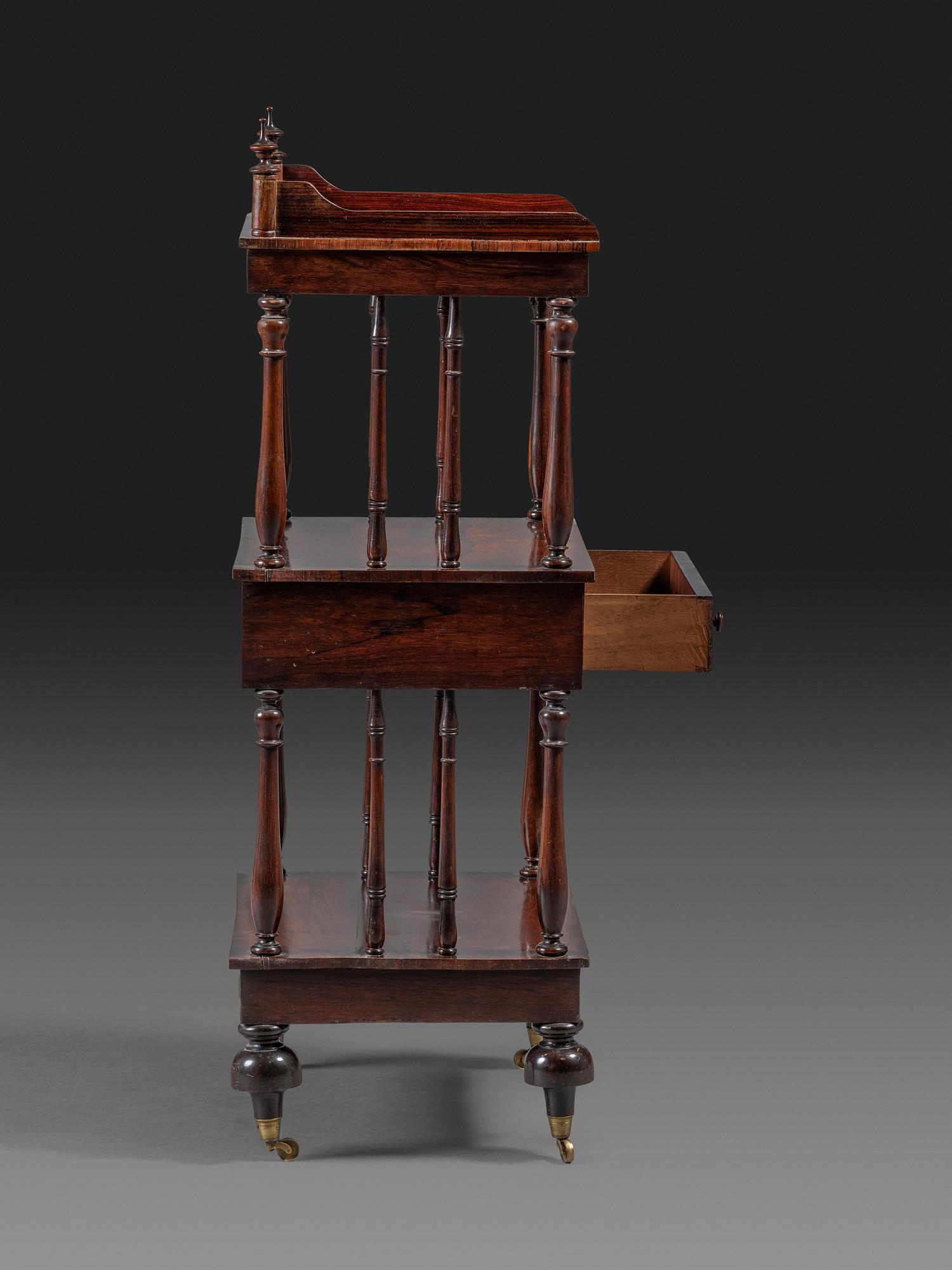 A Regency Rosewood Three-Tiered Etagere
