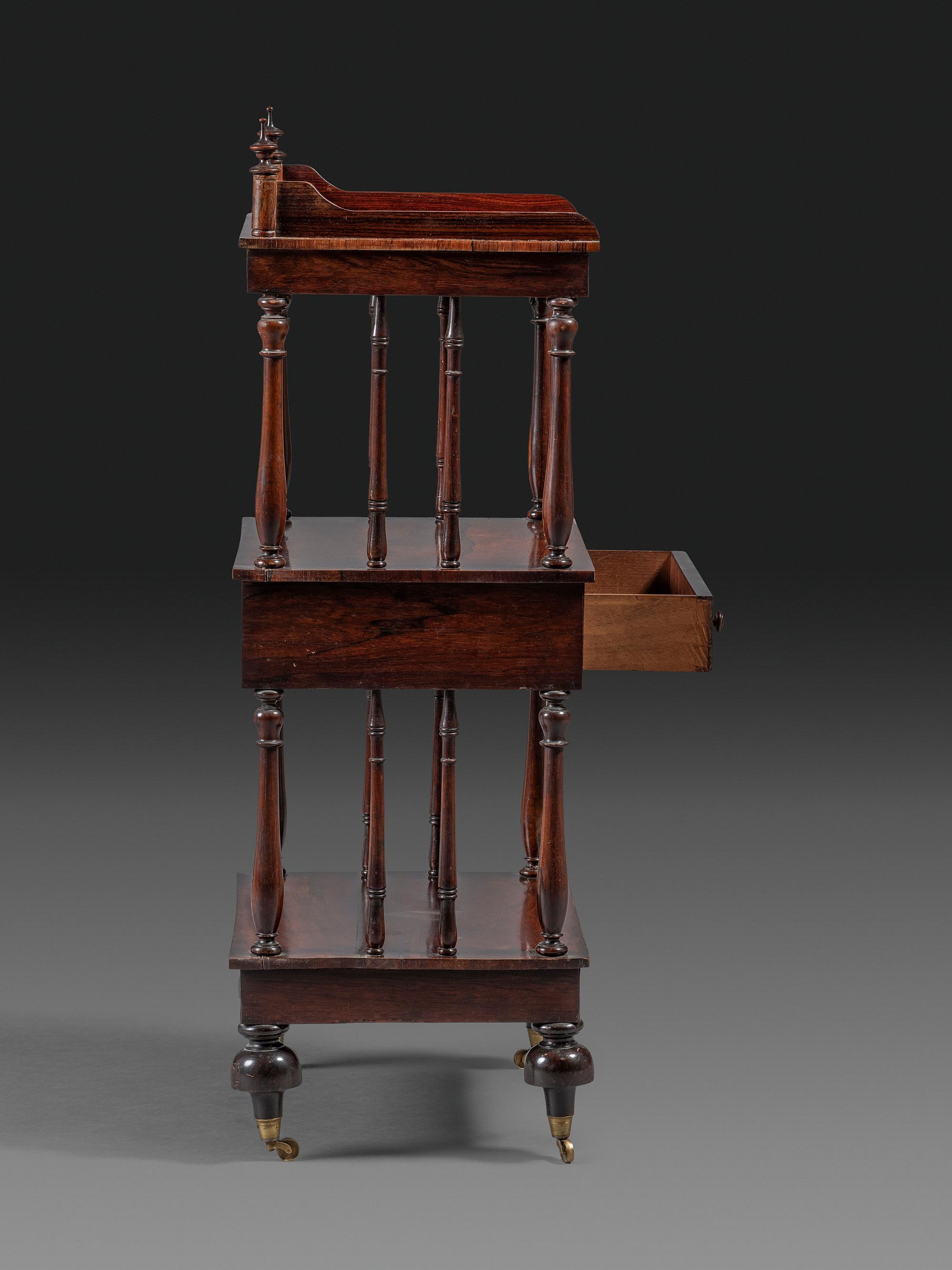 A Regency Rosewood Three-Tiered Etagere