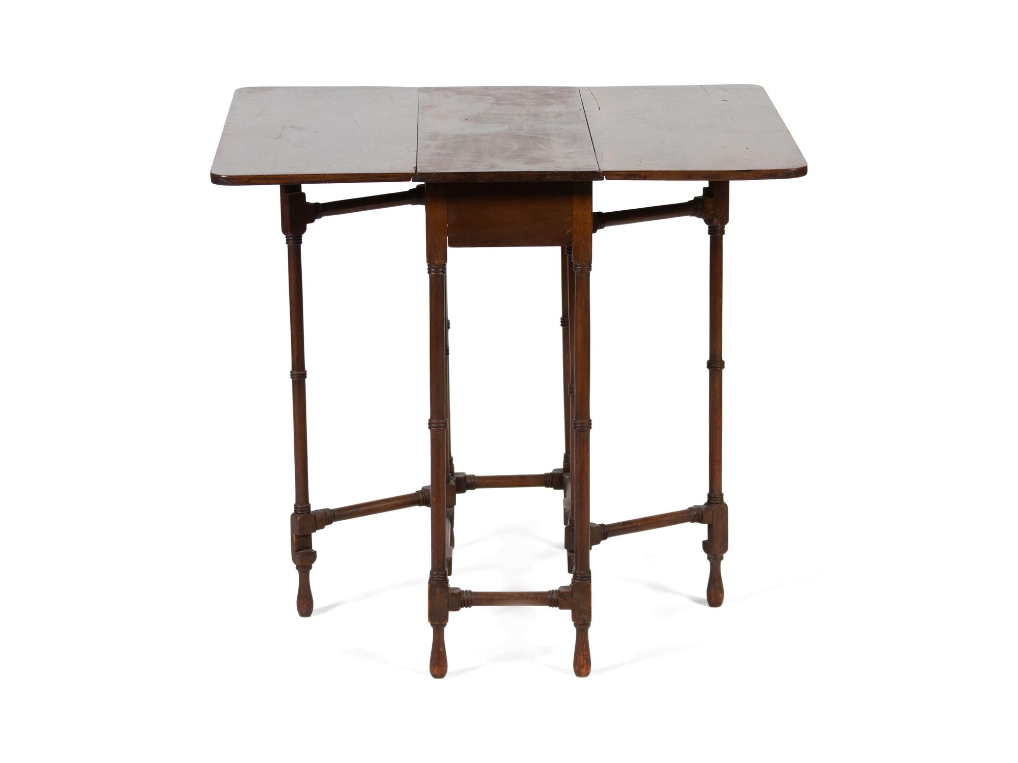 A Victorian Mahogany Spider Leg Table — 19TH CENTURY
