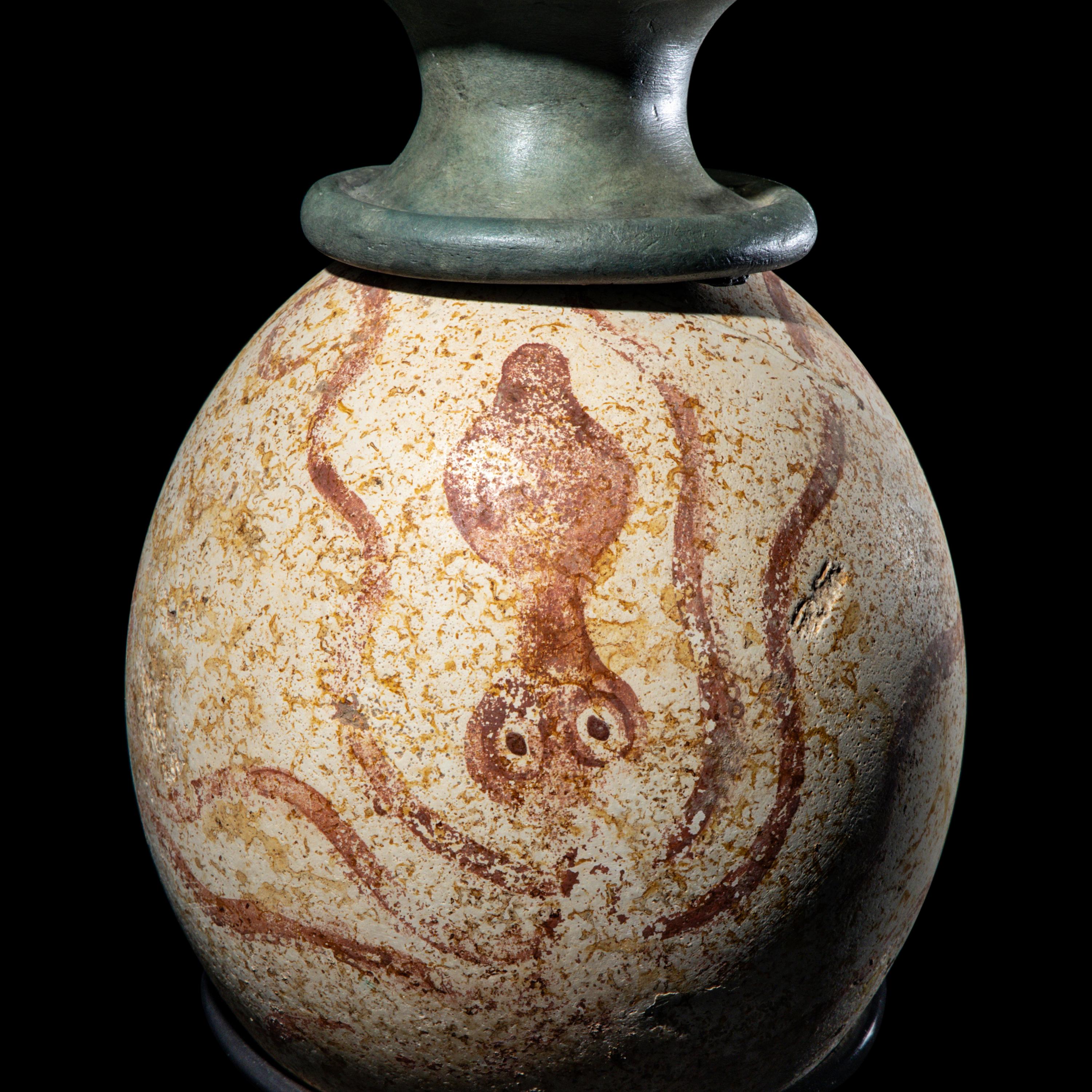 A Minoan or Mycenaean Painted Ostrich Egg Rhyton