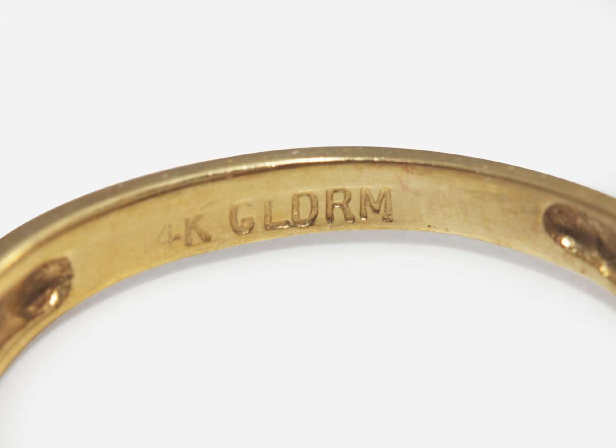 A Group of Yellow Gold and Gem-Set Rings
