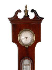 A George III Mahogany and Marquetry Wheel Barometer