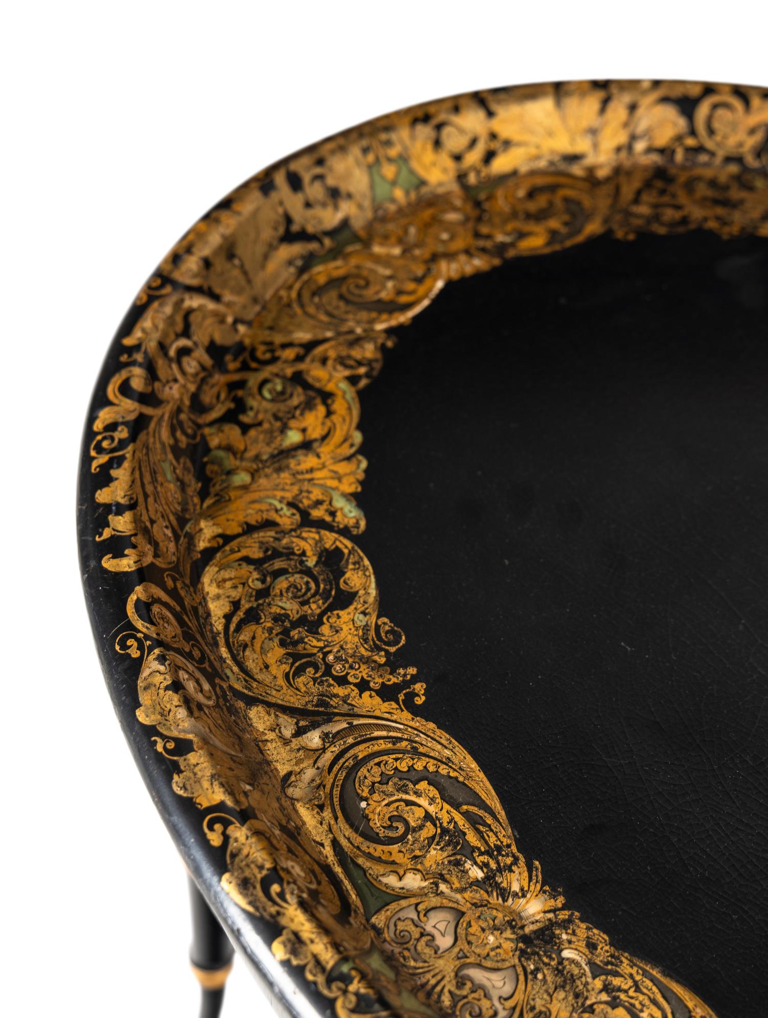 A Victorian Black Lacquer and Parcel Gilt Papier Mache Tray on Stand