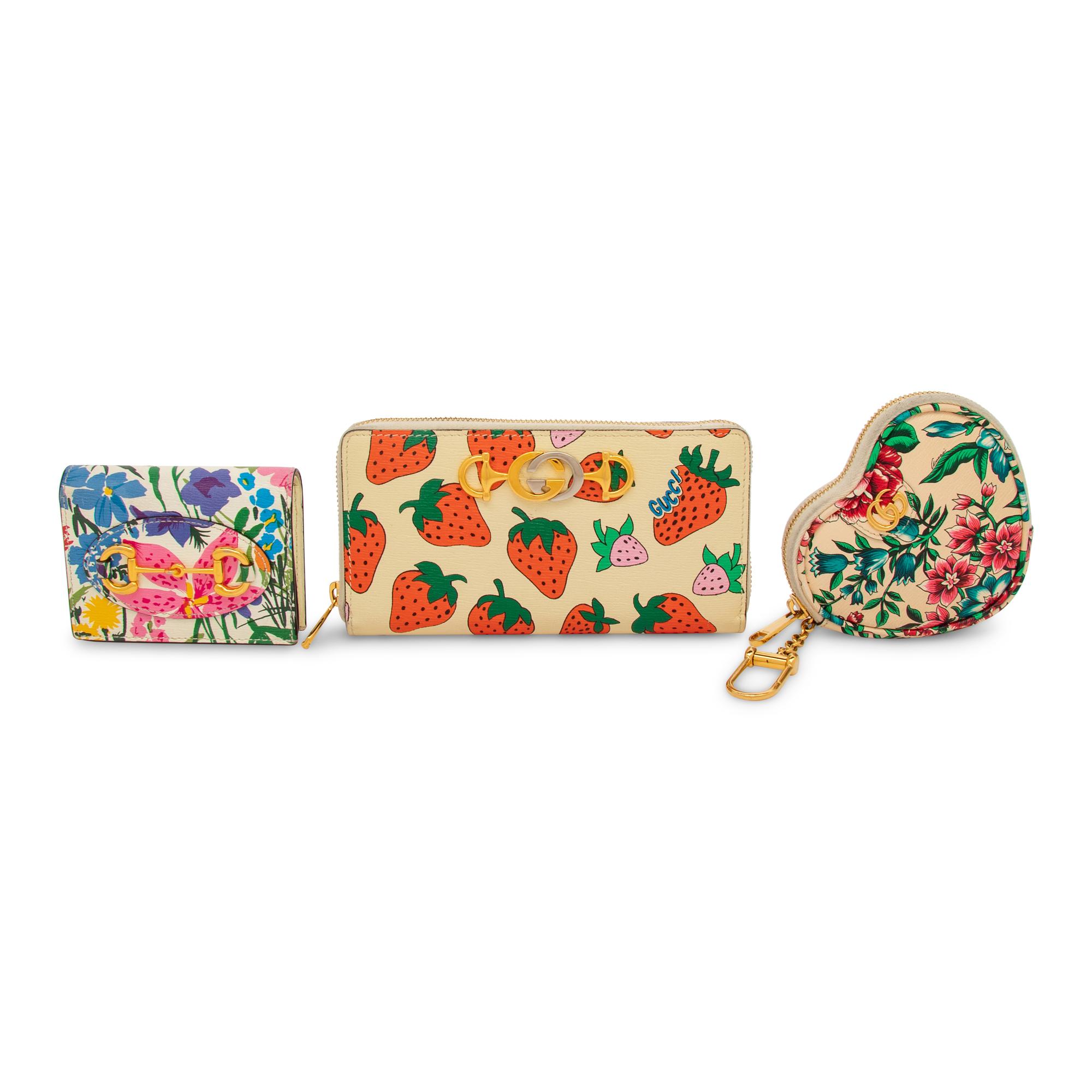 GUCCI, THREE PRINTED WALLETS