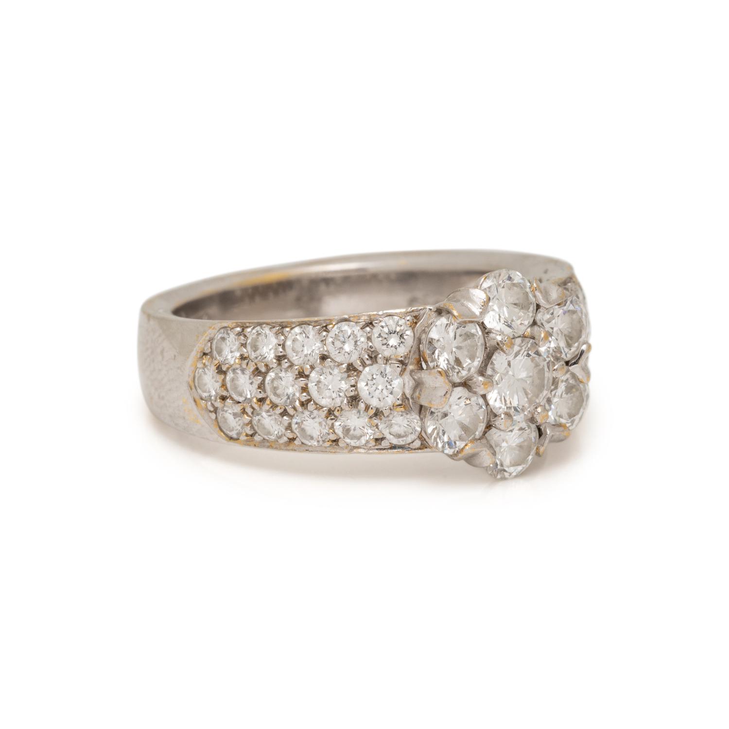 VAN CLEEF & ARPELS, WHITE GOLD AND DIAMOND 'FLEURETTE' RING