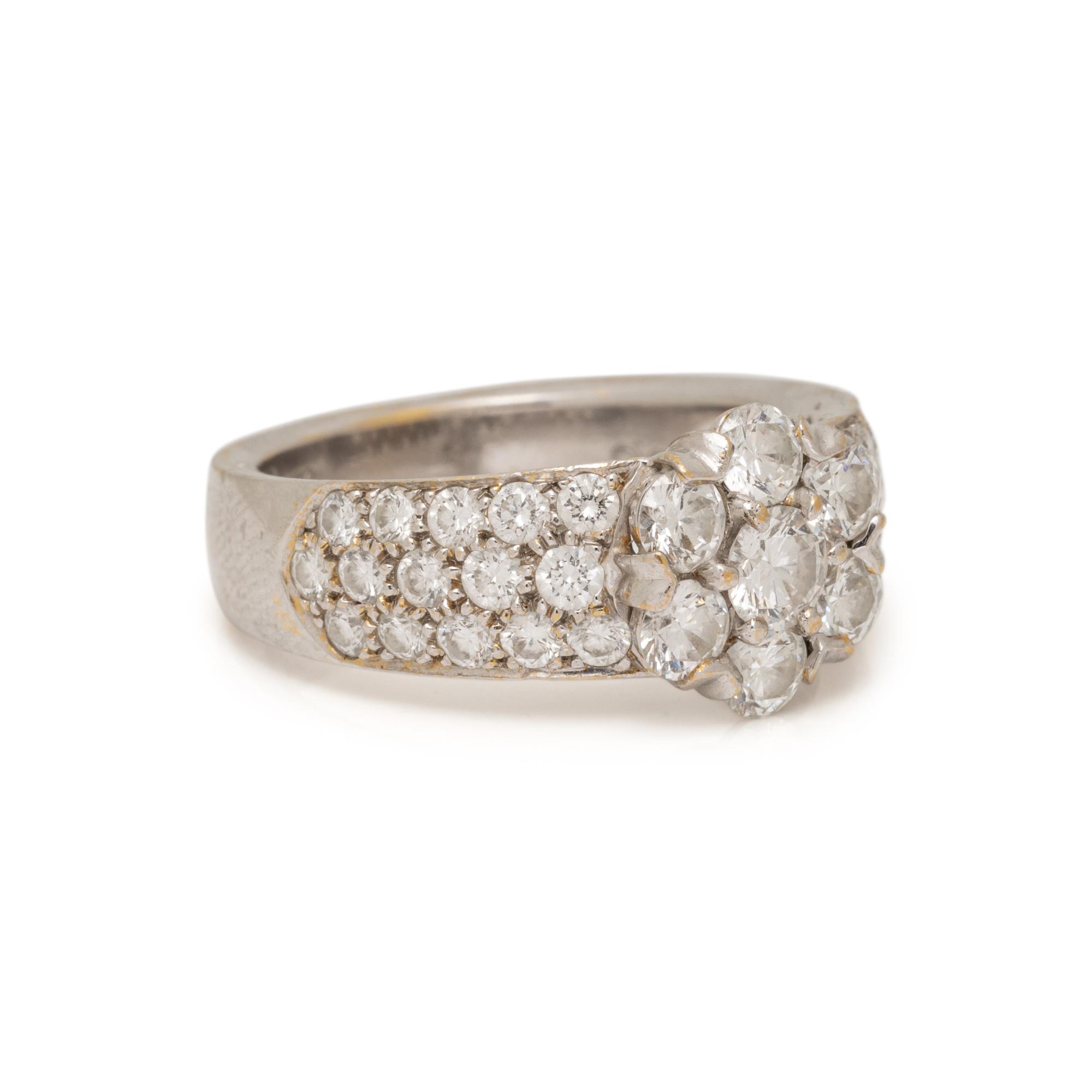 VAN CLEEF & ARPELS, WHITE GOLD AND DIAMOND 'FLEURETTE' RING