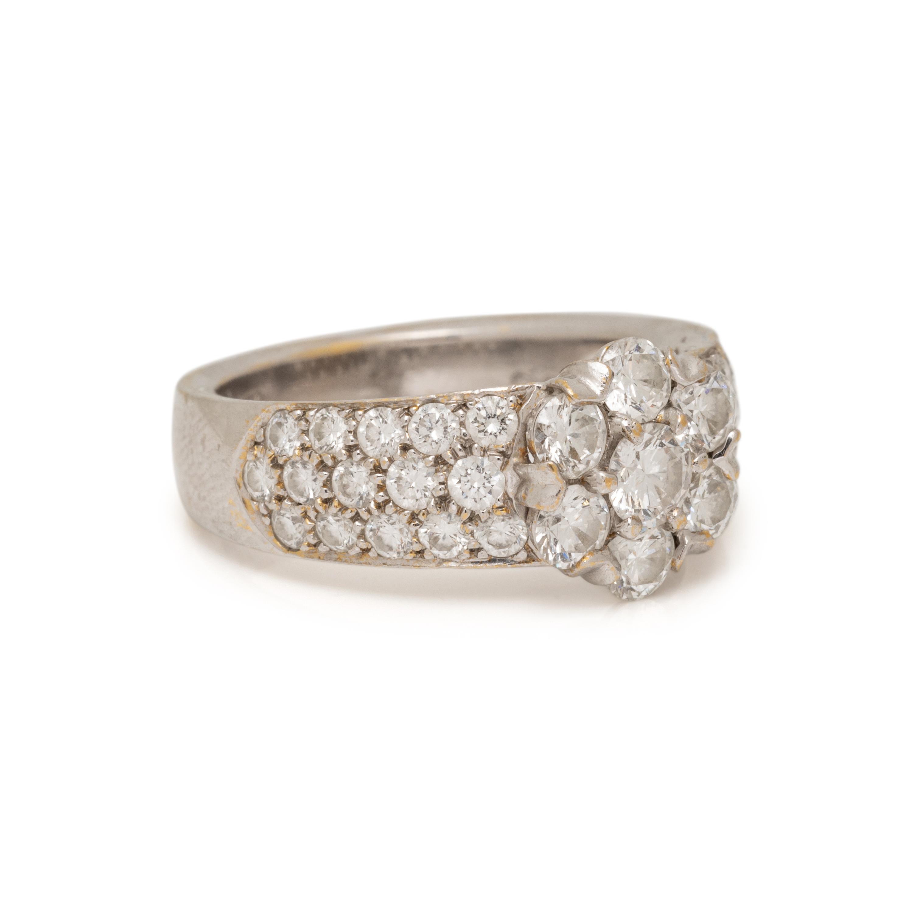 VAN CLEEF & ARPELS, WHITE GOLD AND DIAMOND 'FLEURETTE' RING