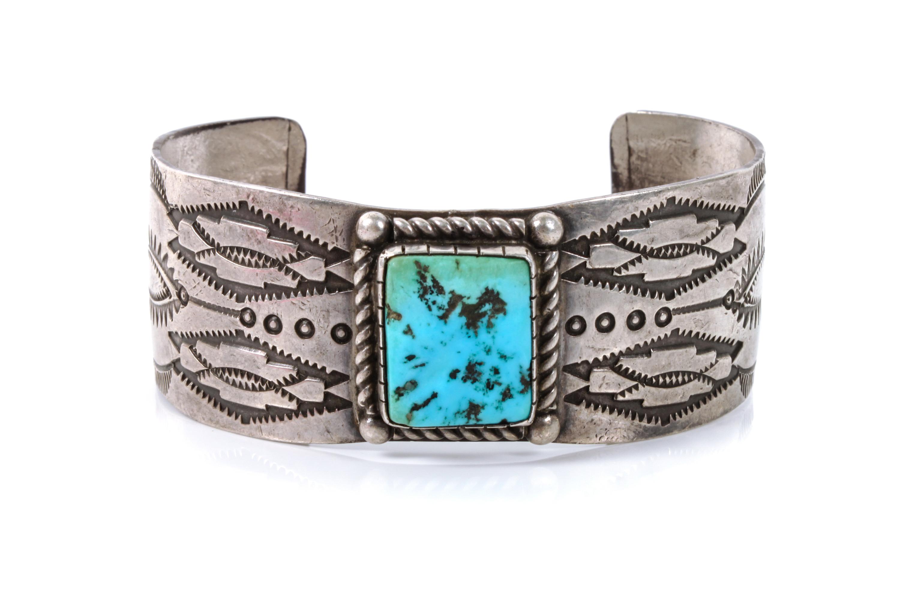 A Navajo Silver and Turquoise Cuff Bracelet Length 6 3/4 x opening 1 1/2 x width 1 inches.