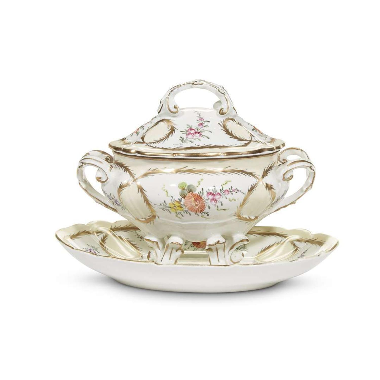 A small Paris porcelain sauce tureen and stand likely early 20th century