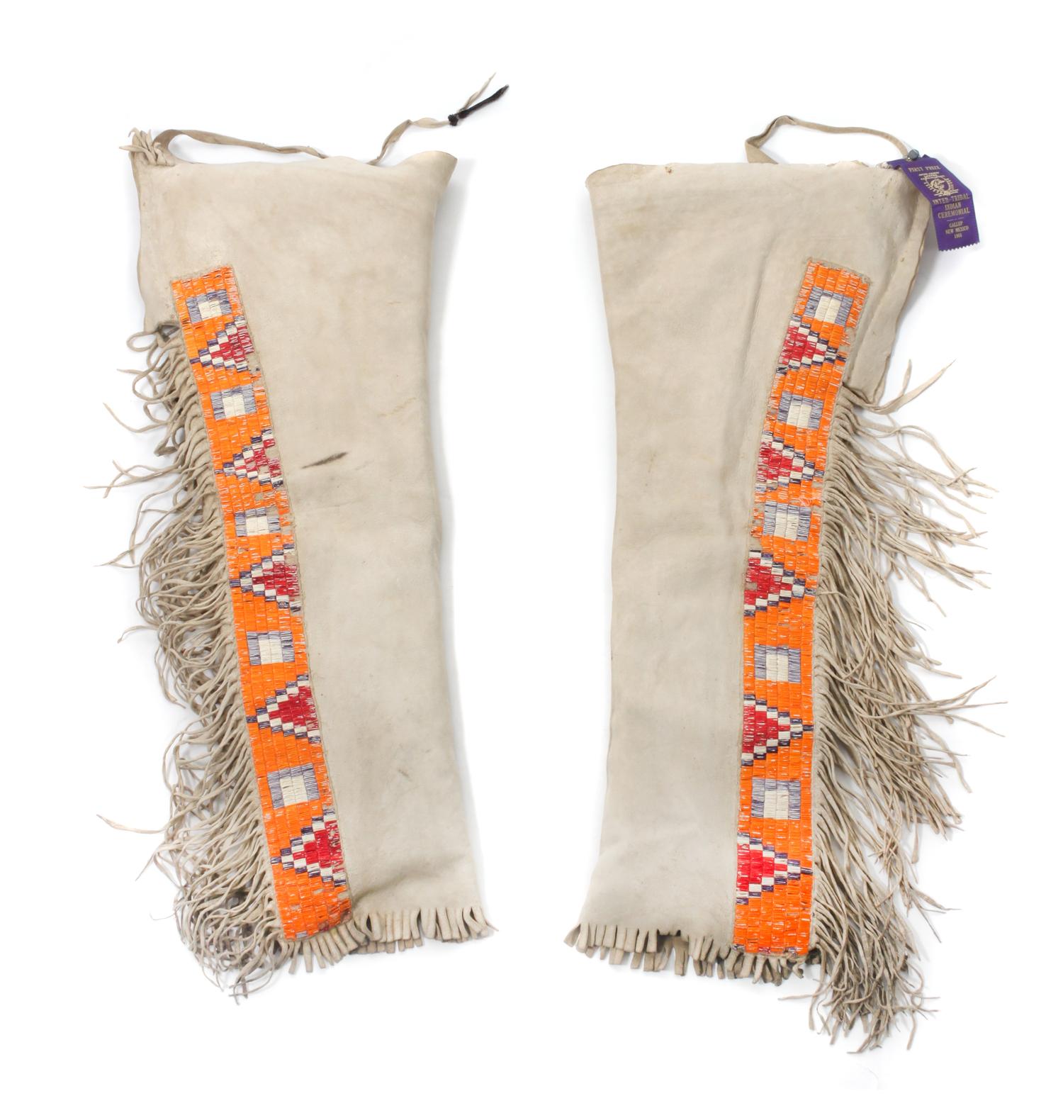 Two Pairs of Blackfeet Quilled Leggings Length of first 33 1/2 inches.