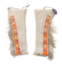 Two Pairs of Blackfeet Quilled Leggings Length of first 33 1/2 inches.