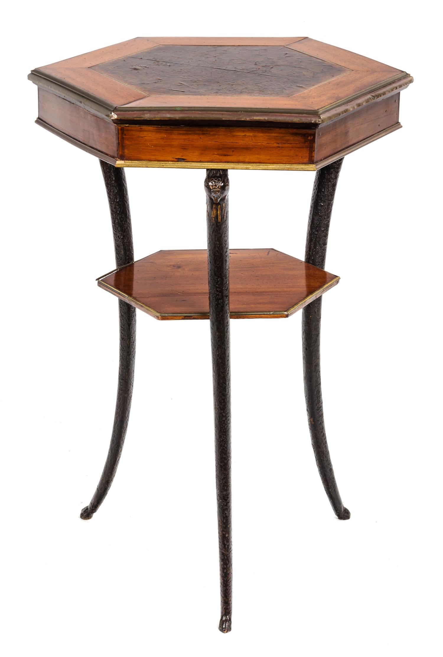 A North European Brass-Mounted Mahogany Ebonized and Burr Birch Gueridon Height 28 1/2 x width 18 inches. — 19TH CENTURY