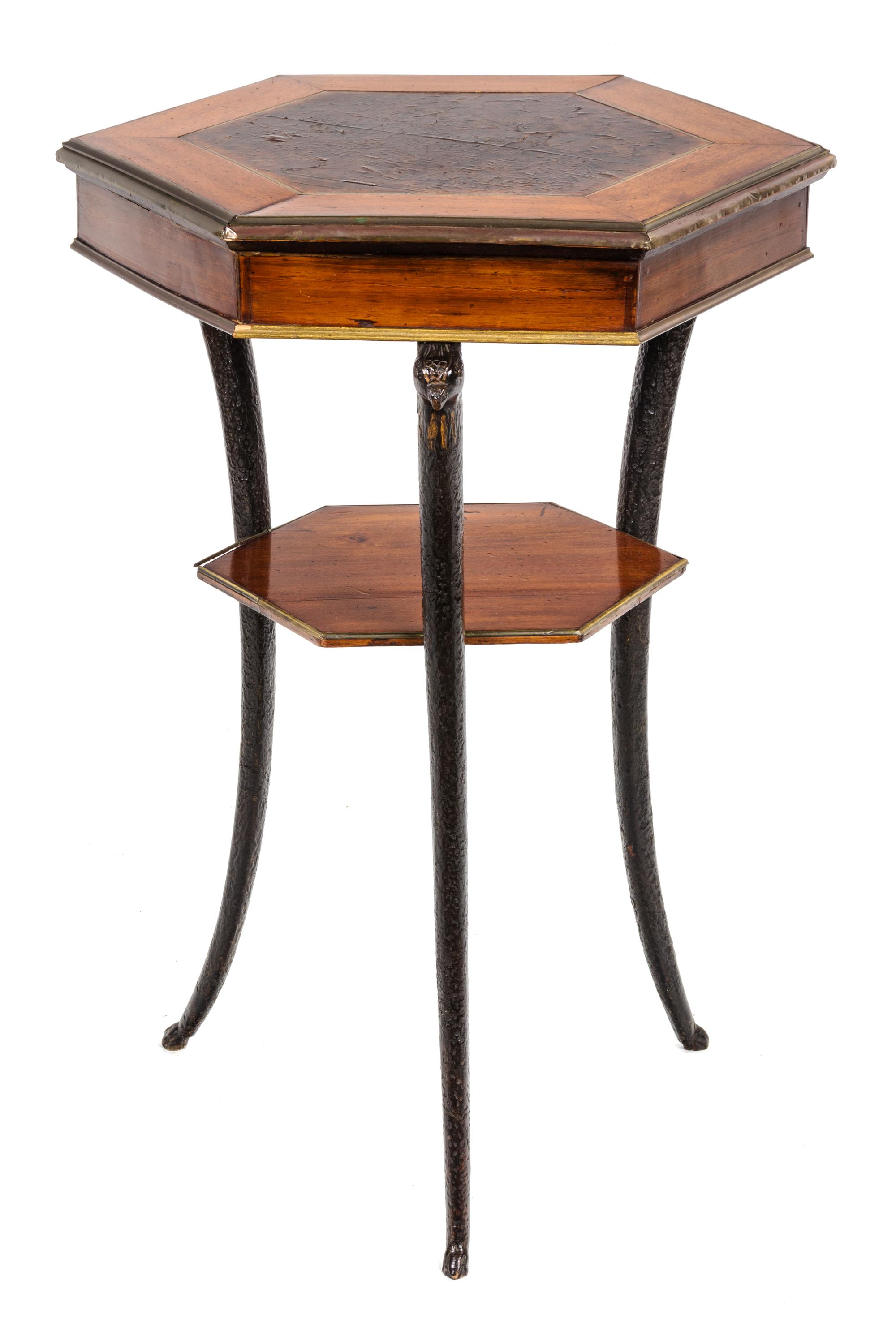 A North European Brass-Mounted Mahogany Ebonized and Burr Birch Gueridon Height 28 1/2 x width 18 inches. — 19TH CENTURY