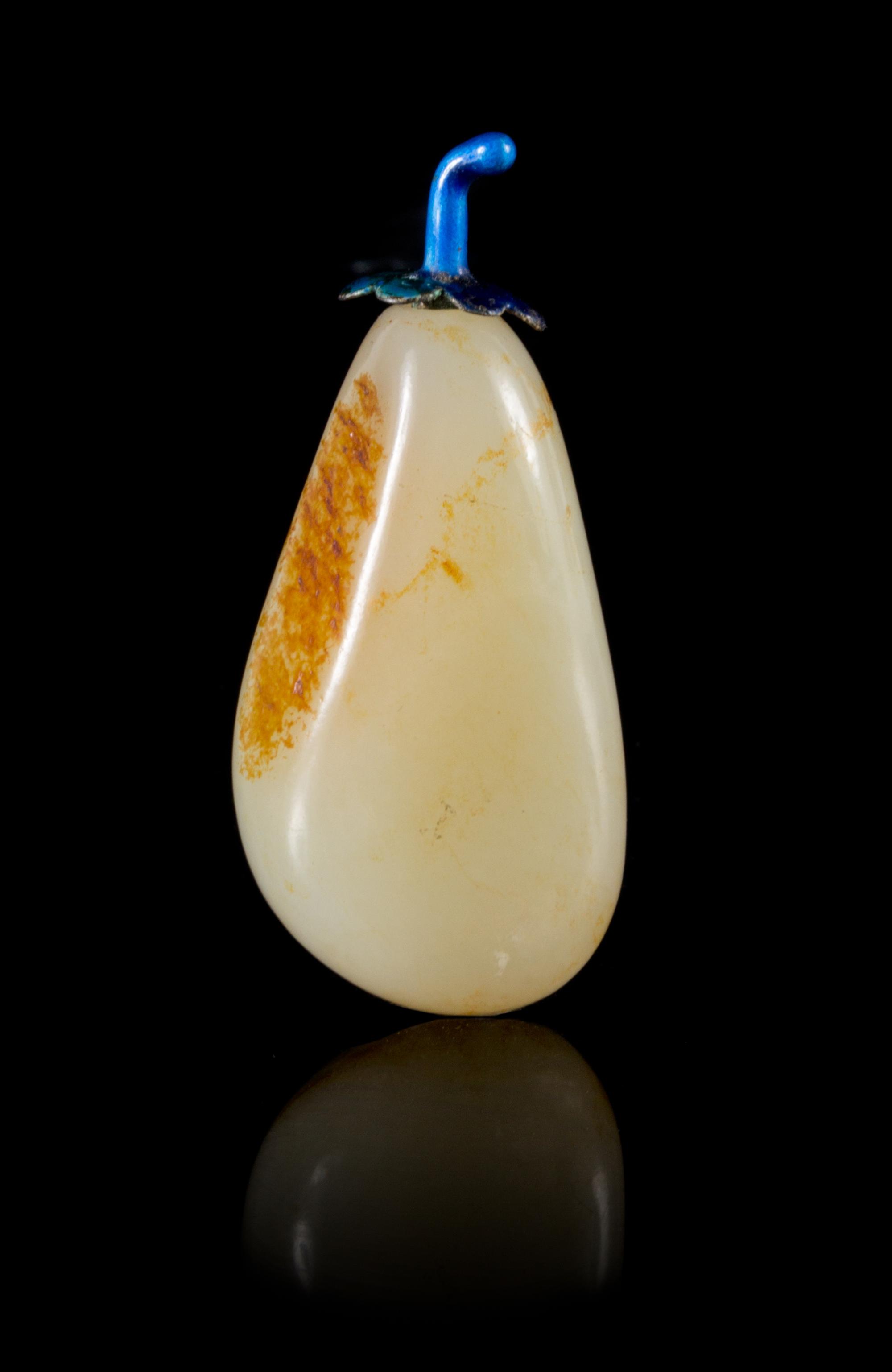 A Pale Celadon and Russet Jade Snuff Bottle Height 3 inches.