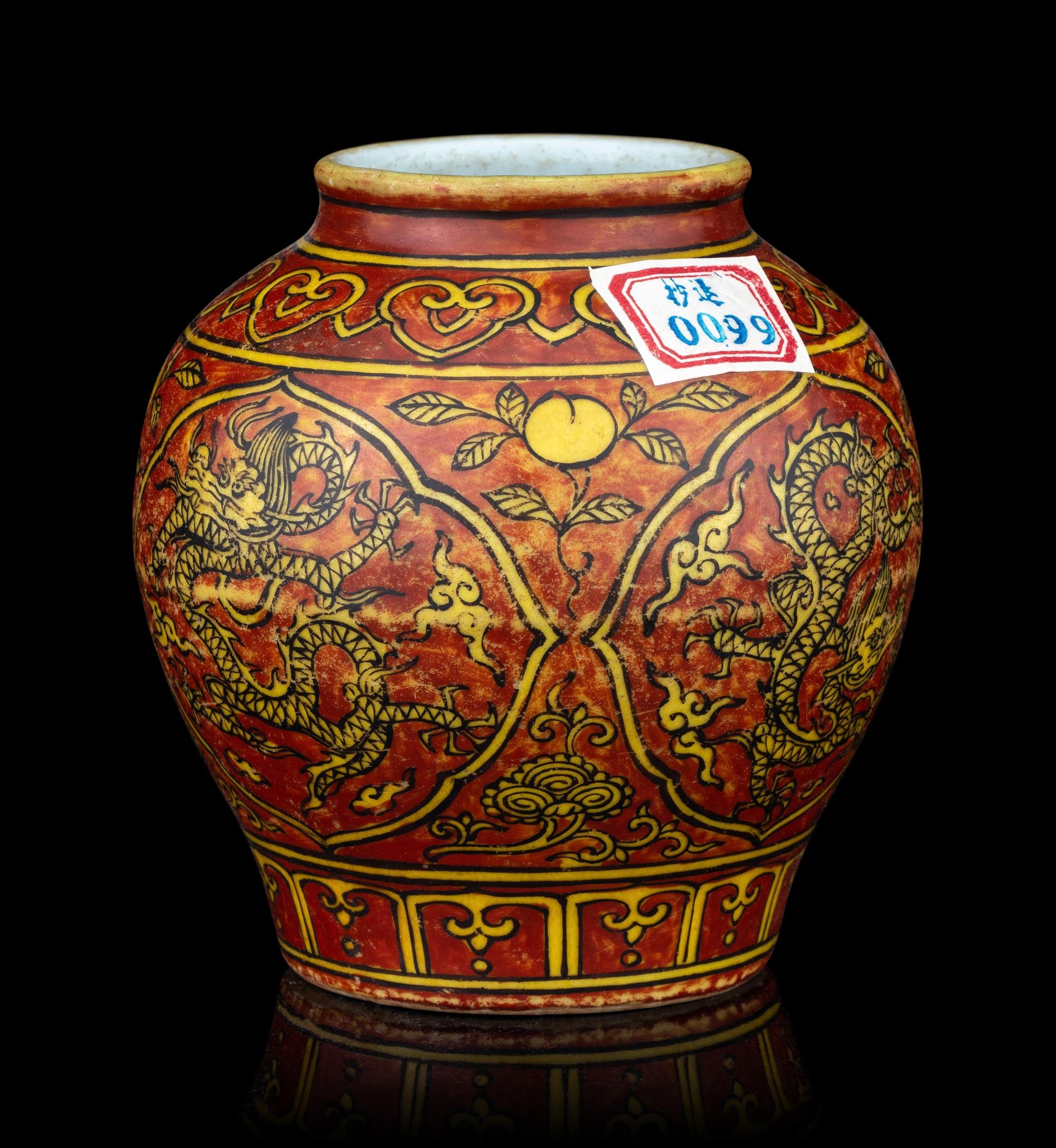 A Small Iron Red and Yellow Glazed 'Dragon' Jar
