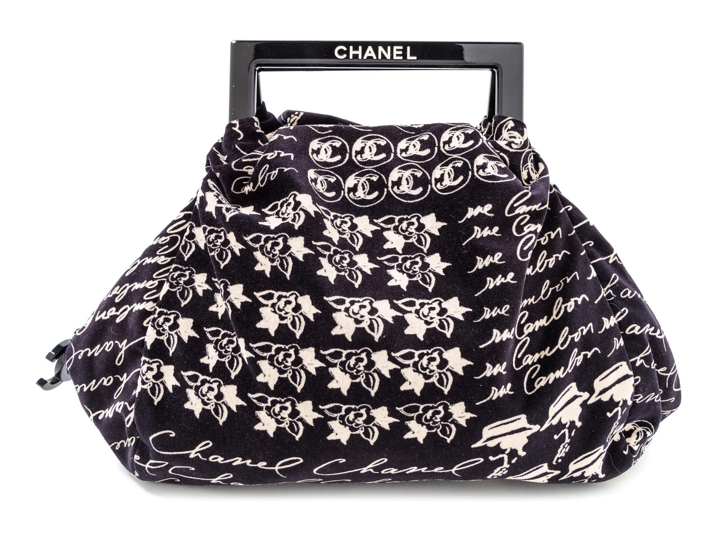 A Chanel Black Velvet Frame Handle Hobo Bag, 11" x 14.5" x 2.5"; Top handle 2.5''.