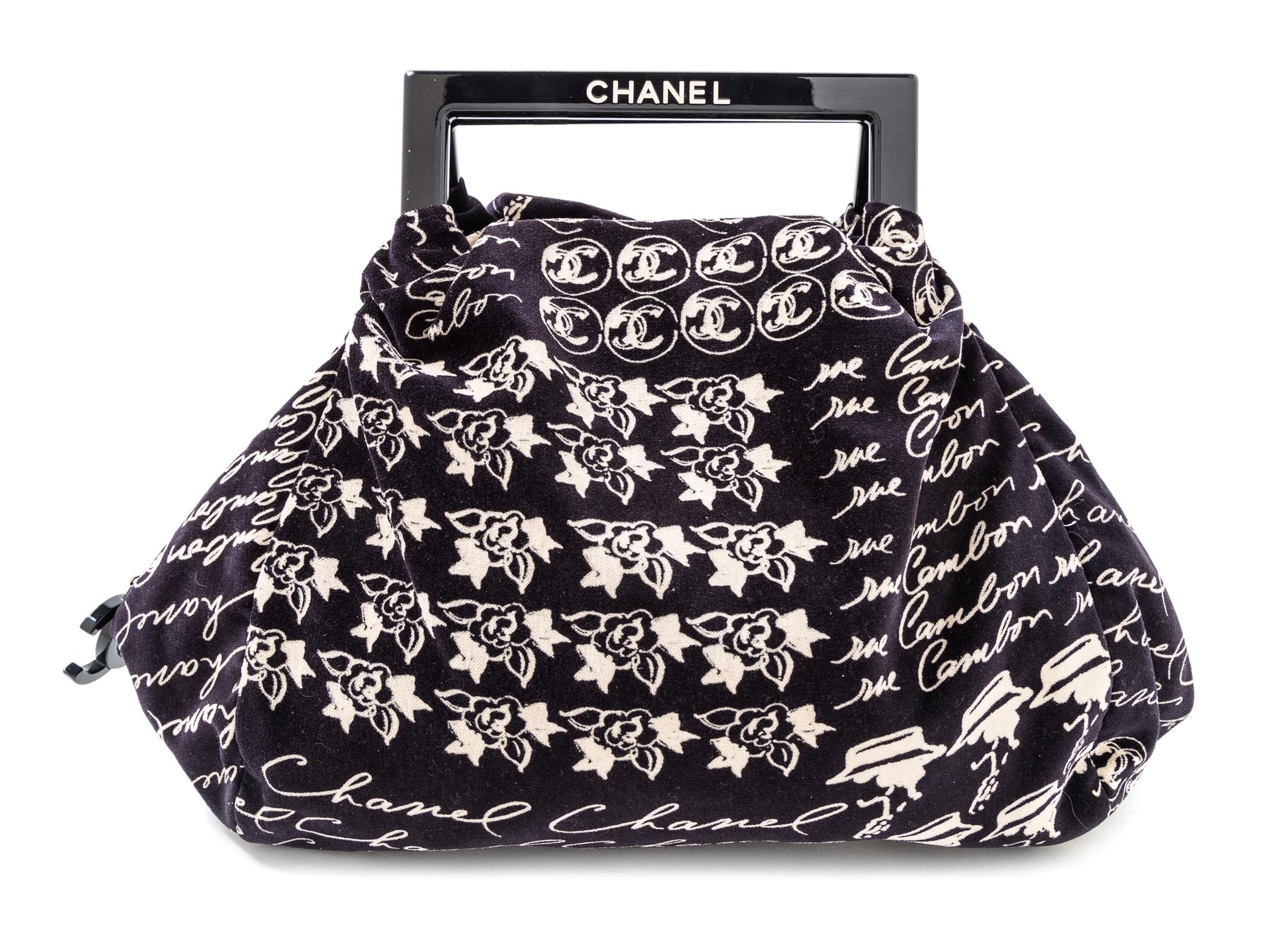 A Chanel Black Velvet Frame Handle Hobo Bag, 11" x 14.5" x 2.5"; Top handle 2.5''.