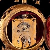 A Louis XV Style Gilt Bronze and Chinese Porcelain Mounted Pagoda-Form Mantel Clock