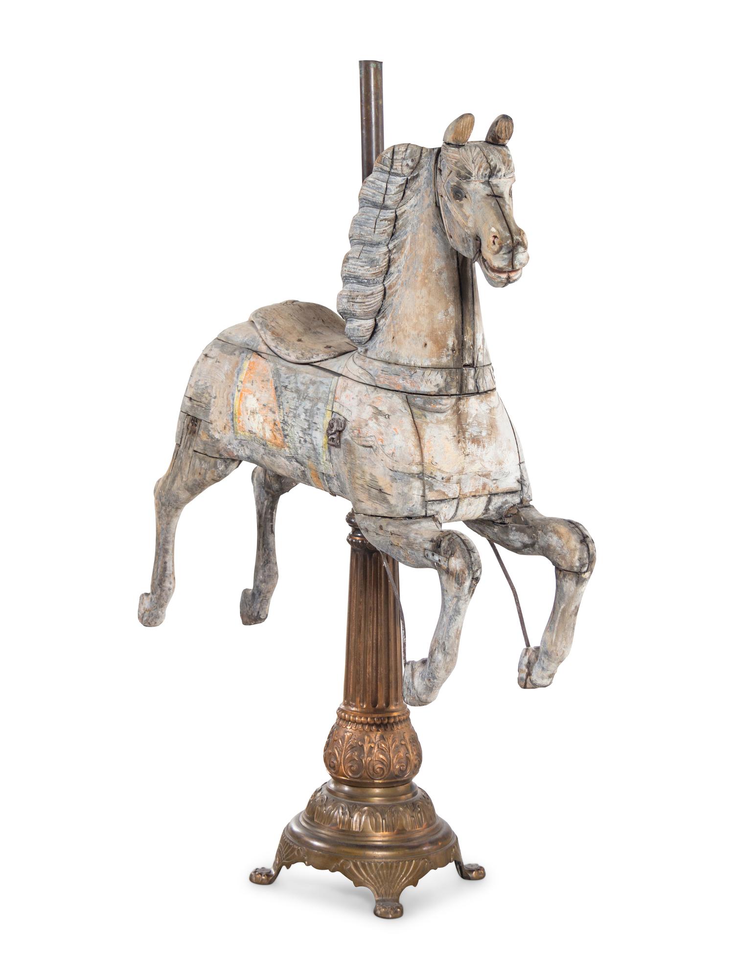 A Carved Pine Horse Form Carousel Figure