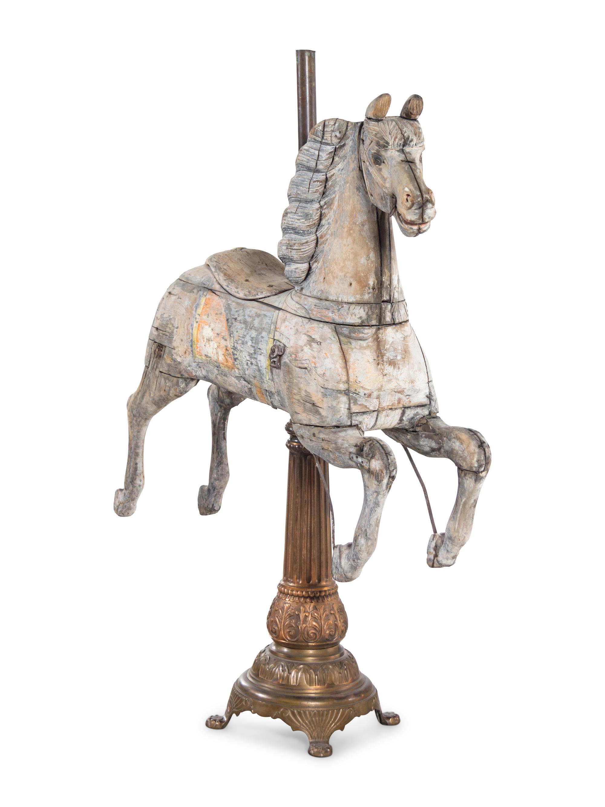 A Carved Pine Horse Form Carousel Figure