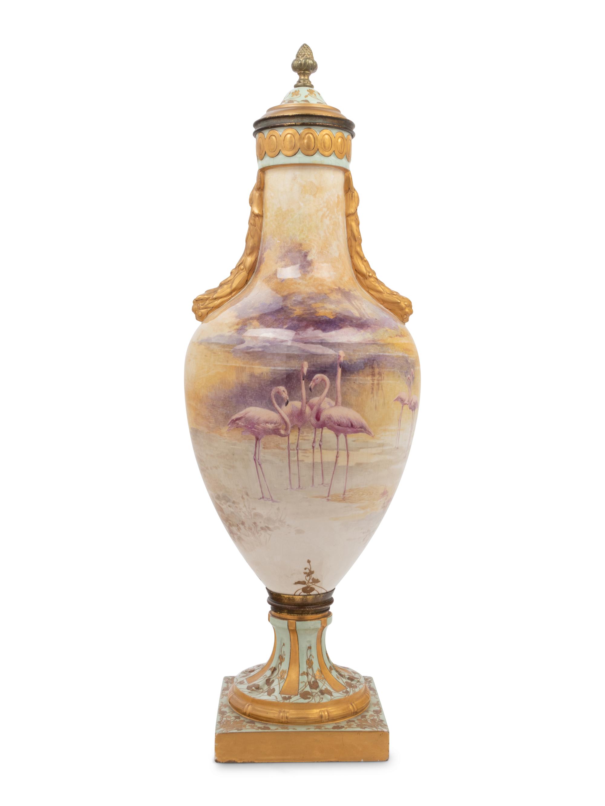 A French Painted and Parcel Gilt Porcelain Urn