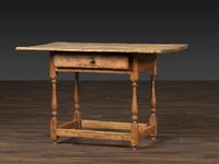 A William and Mary Pine and Maple Scrubbed Top Tavern Table