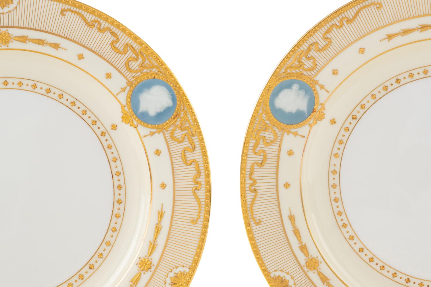 A Set of Fourteen Minton Pâte-sur-Pâte Porcelain Plates