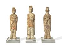 Three Chinese Painted Pottery Figures of Standing Officials