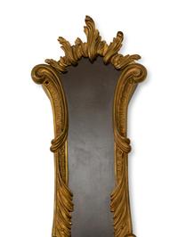 A French Empire Style Ebonized and Parcel Gilt Banjo Clock