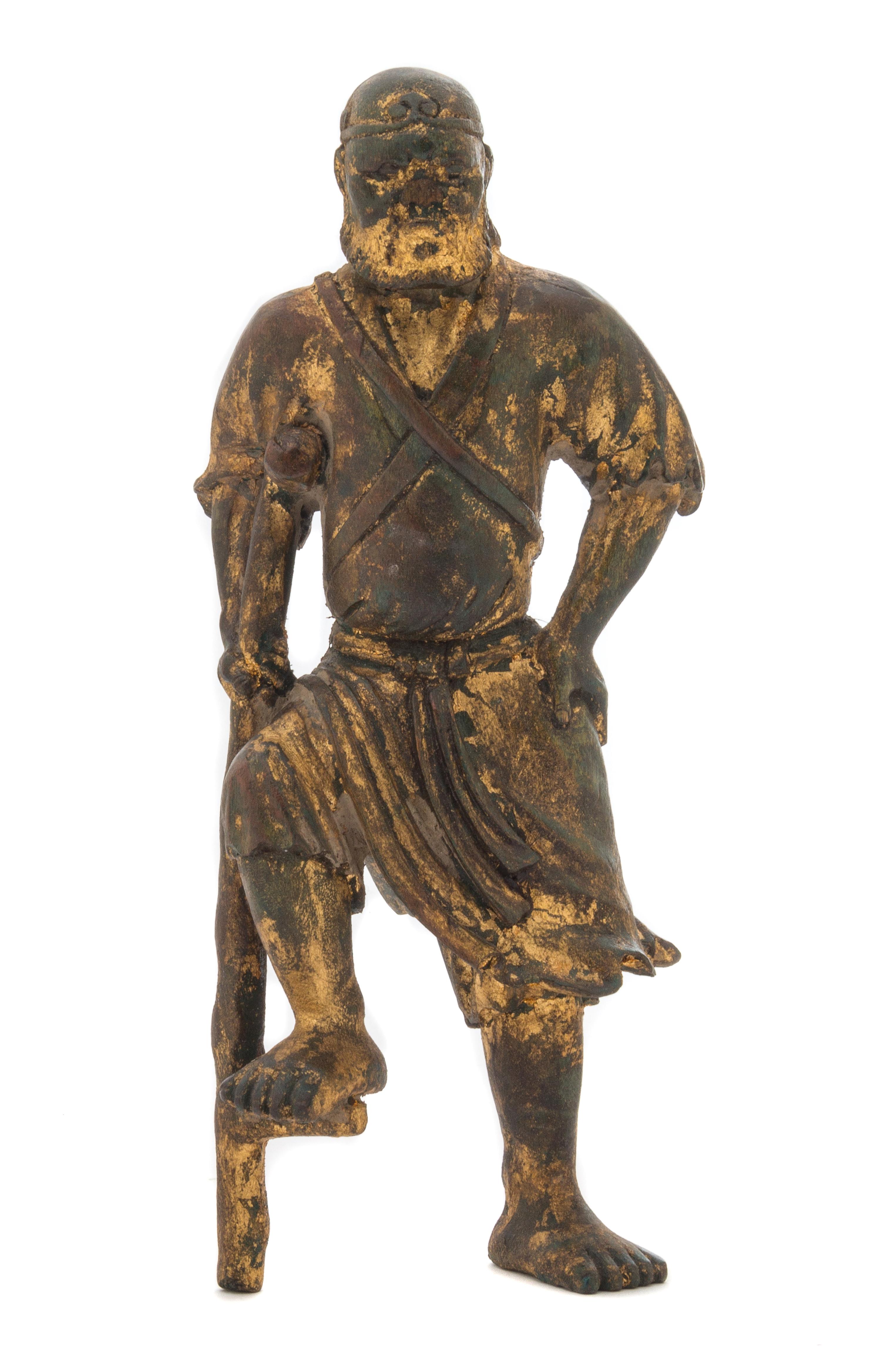 A Gilt Wood Figure of an Immortal Height 10 inches.