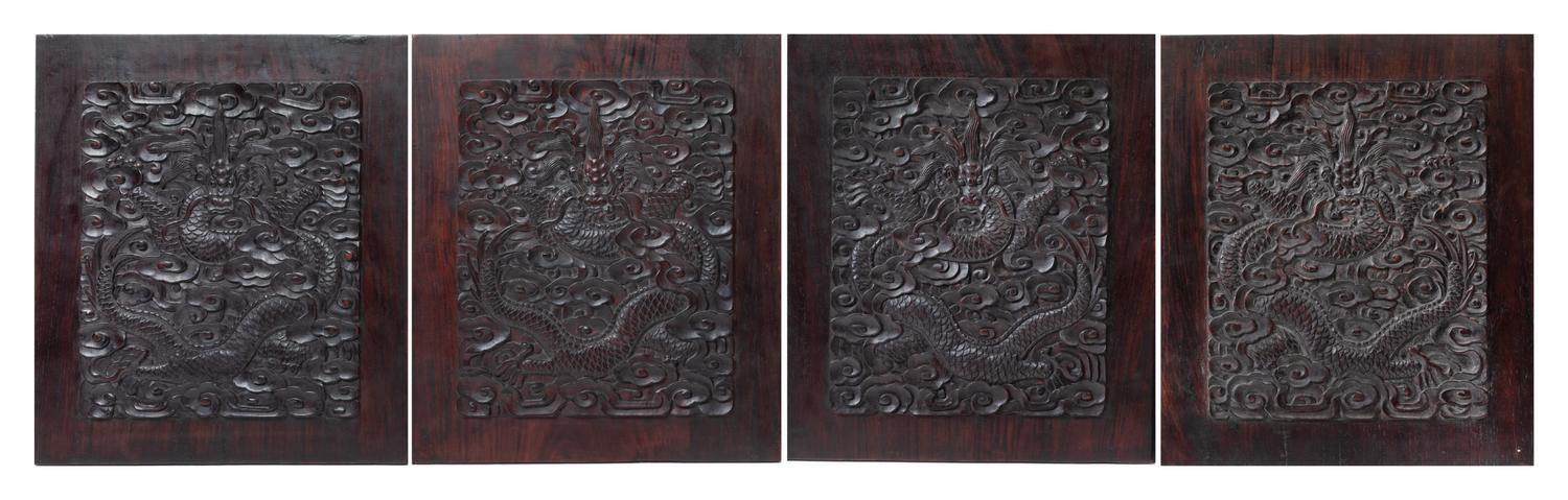 A Set of Four Chinese Zitan Wood 'Dragon' Panels