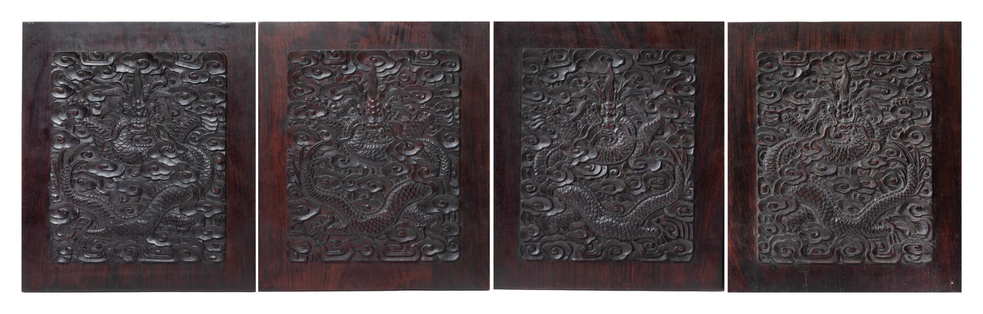 A Set of Four Chinese Zitan Wood 'Dragon' Panels