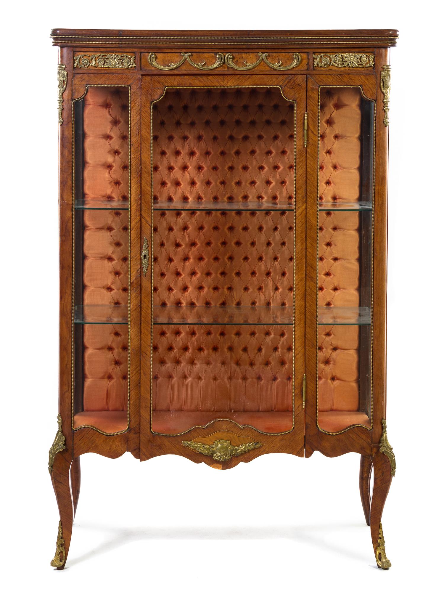 A Louis XV Style Gilt Bronze Mounted Bookmatch Veneered Vitrine, Height 63 1/4 x width 41 1/2 x depth 17 1/4 inches.