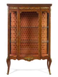 A Louis XV Style Gilt Bronze Mounted Bookmatch Veneered Vitrine, Height 63 1/4 x width 41 1/2 x depth 17 1/4 inches.