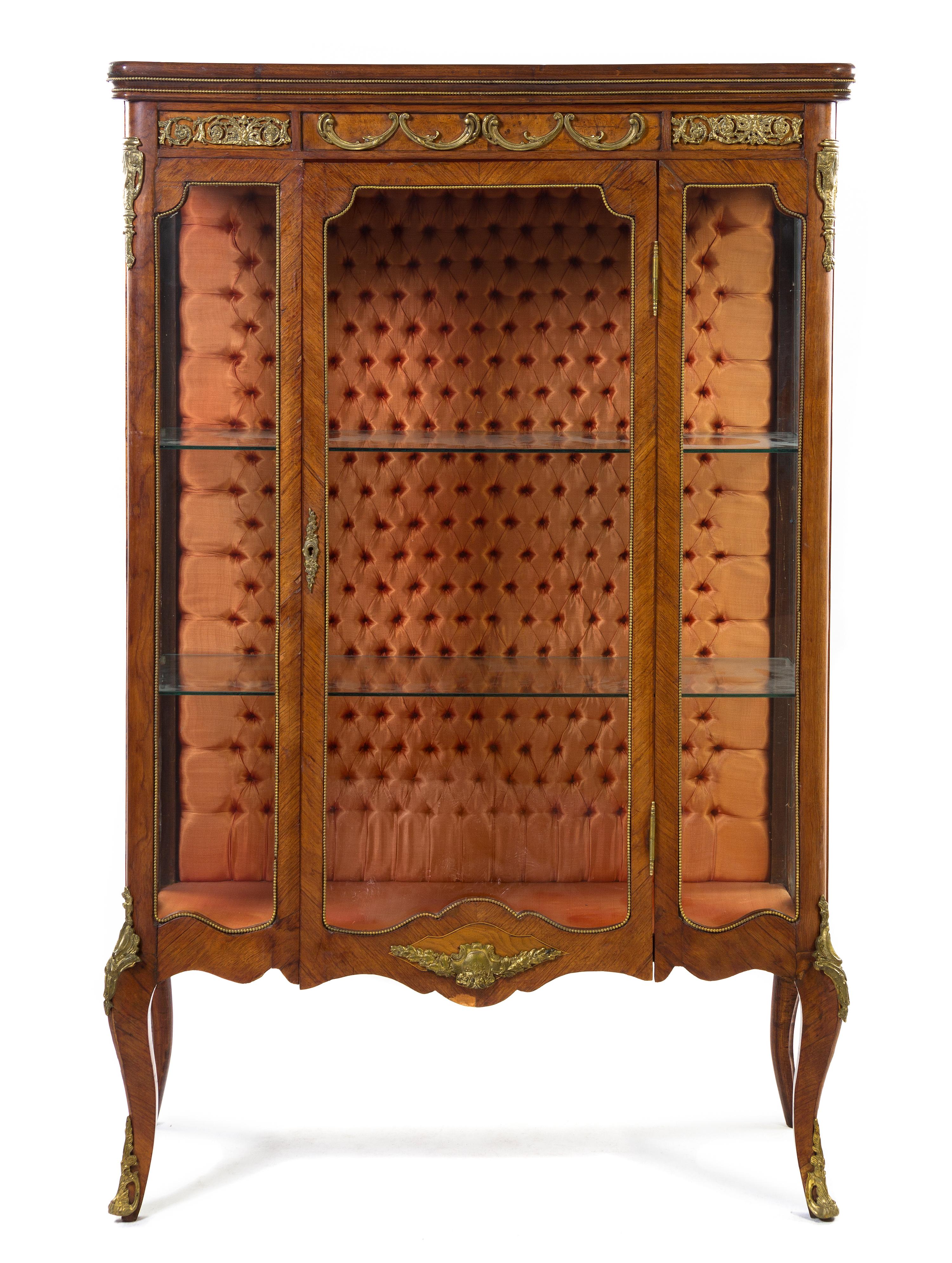 A Louis XV Style Gilt Bronze Mounted Bookmatch Veneered Vitrine, Height 63 1/4 x width 41 1/2 x depth 17 1/4 inches.