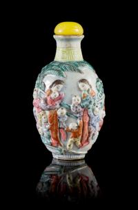 A Famille Rose Porcelain Snuff Bottle Height 3 1/4 inches.