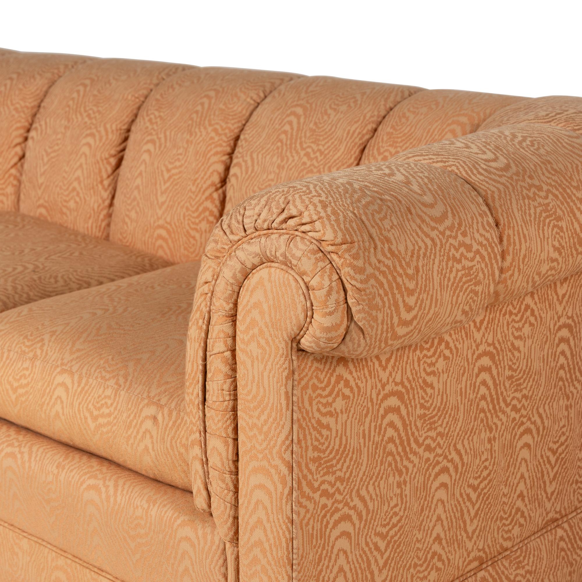 A Pair of Custom Upholstered Three-Cushion Roll-Arm Sofas