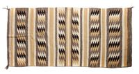 Three Navajo Rugs Largest: 69 x 34 1/2 inches