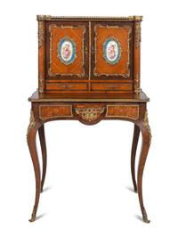 A Louis XV Style Gilt Metal and Sèvres Style Porcelain Mounted Parquetry Bonheur du Jour