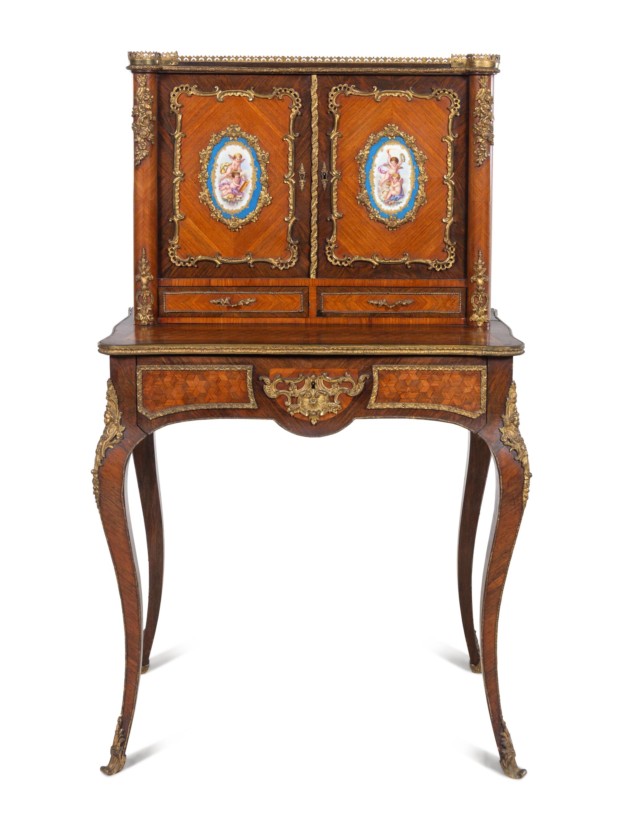 A Louis XV Style Gilt Metal and Sèvres Style Porcelain Mounted Parquetry Bonheur du Jour