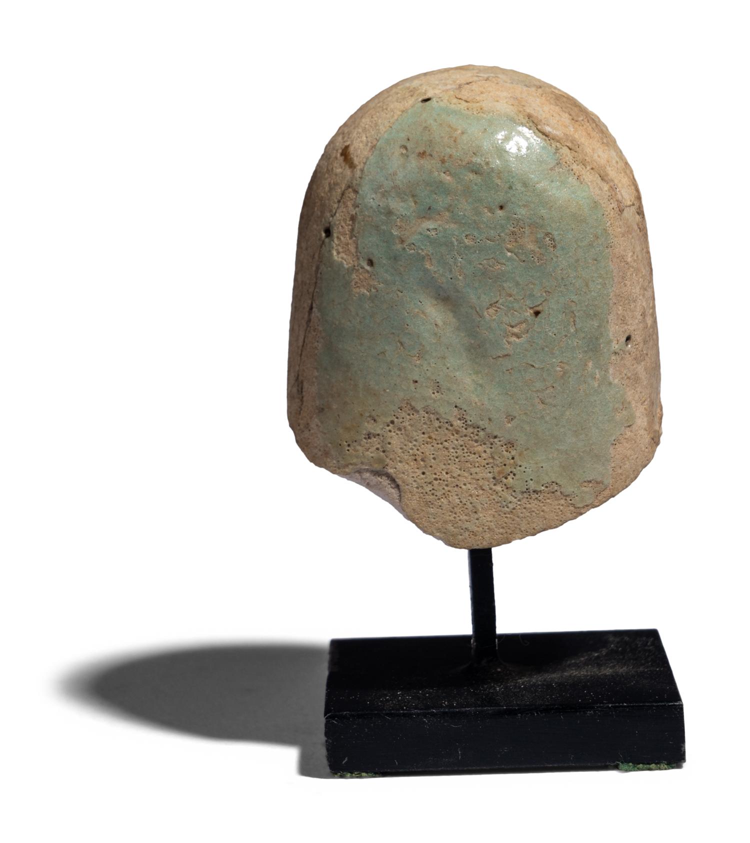 An Egyptian Faience Ushabti Head