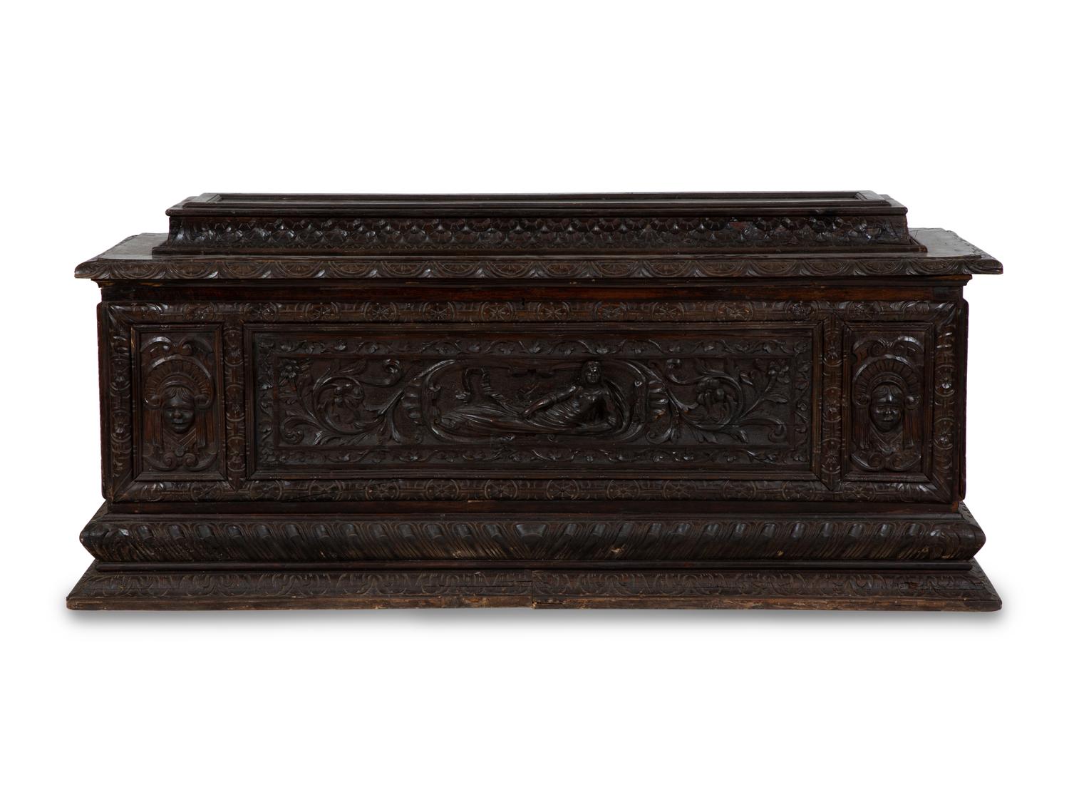 An Italian Renaissance Revival Carved Oak Cassone