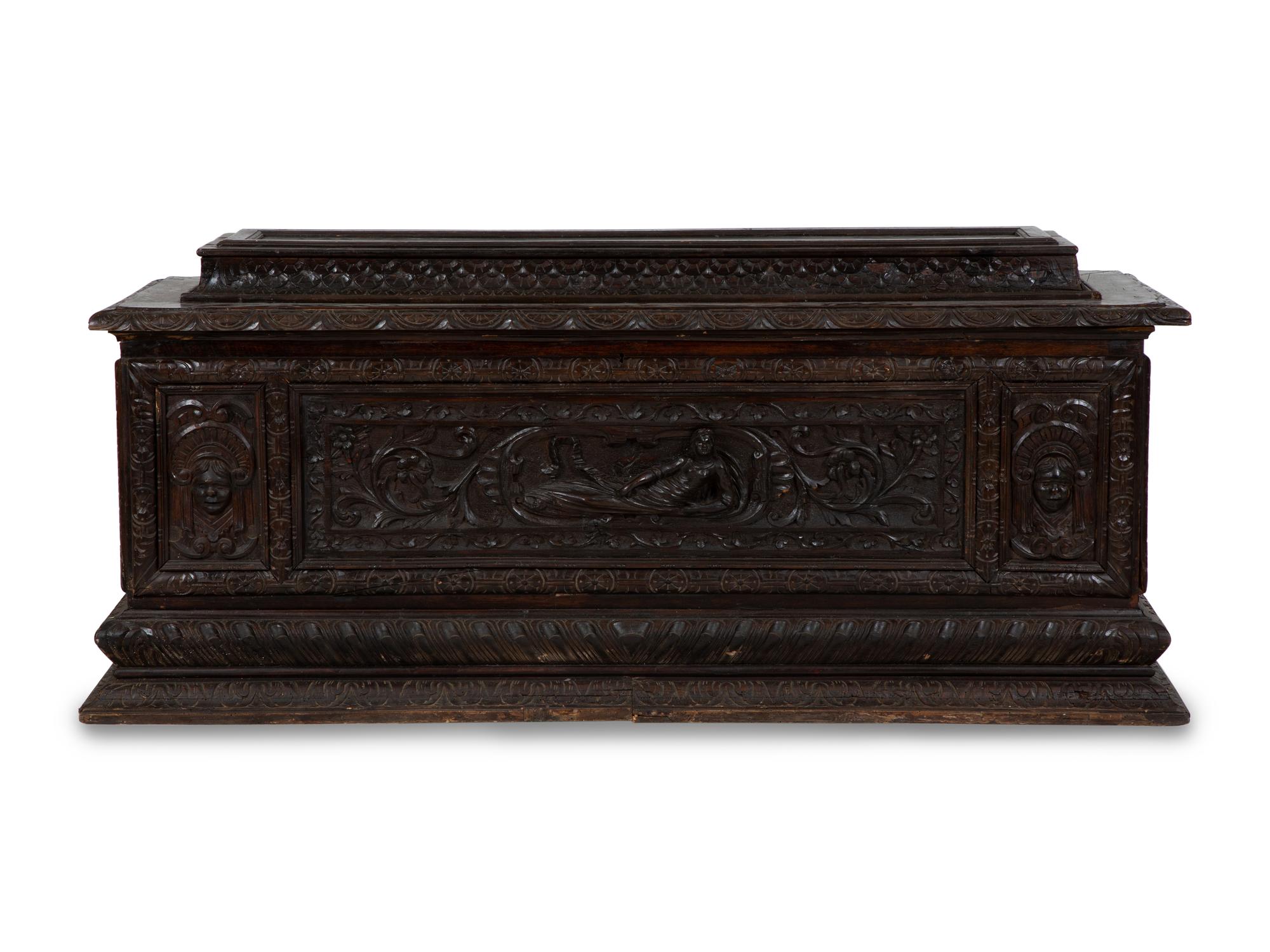 An Italian Renaissance Revival Carved Oak Cassone